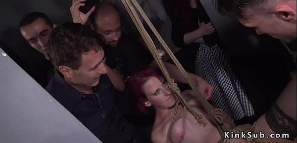  Redhead gangbanged in bar in suspension